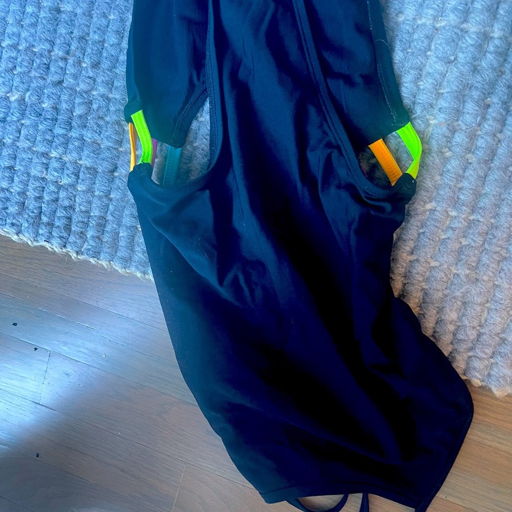 Great black Jolyn one piece swim suit! Colorful straps on side! Great condition!
